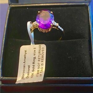 10k gold, AAA Moroccan amethyst ring flanked by diamonds size 8, 2.8g
